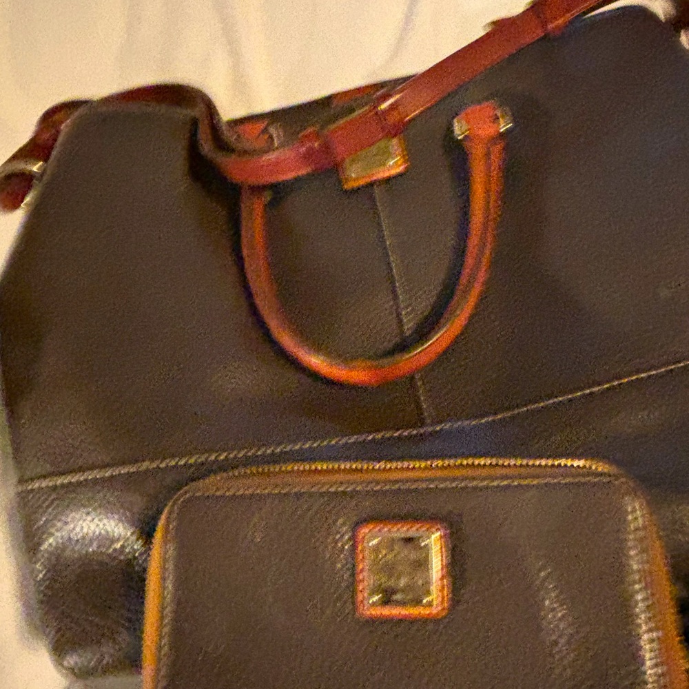 Dooney bag and wallet selling together